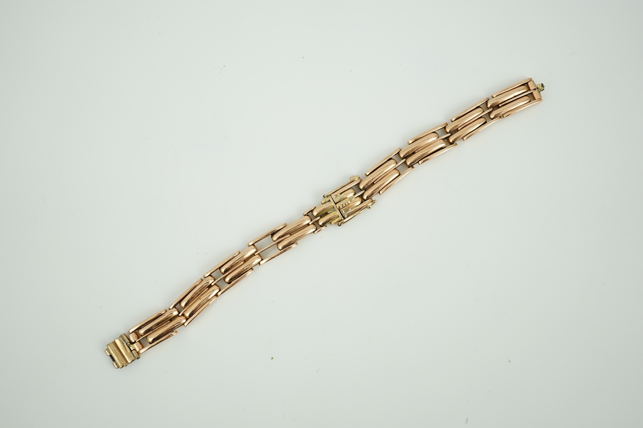 A yellow metal (stamped 12c) watch strap, 20 grams (a.f.)